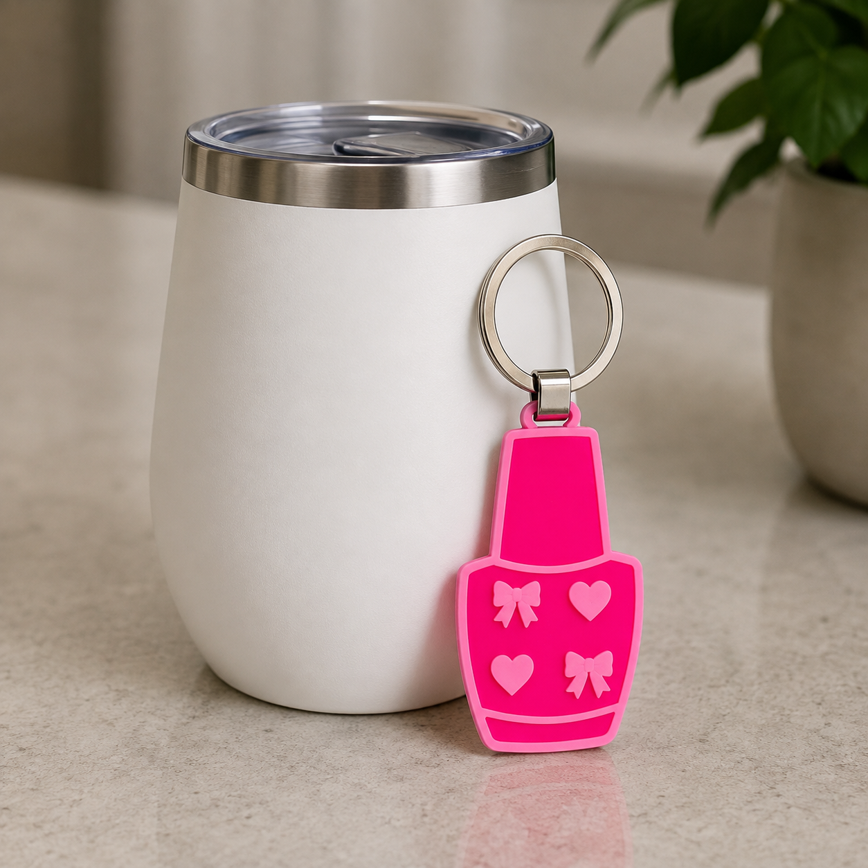 Reusable can tab lifter keychain with pink nail-polish-bottle-inspired design and silver-tone ring