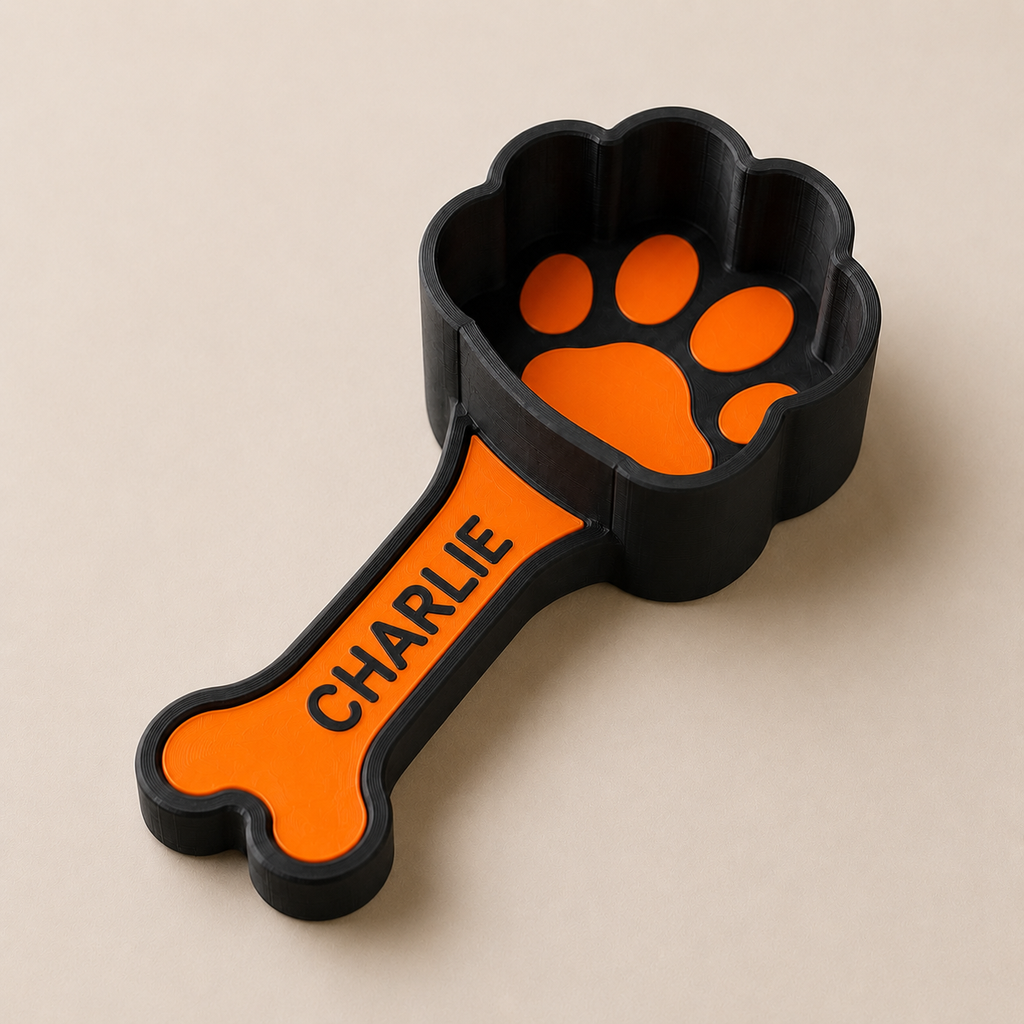 Custom pet food measuring scoop, 3D printed with paw and bone styling