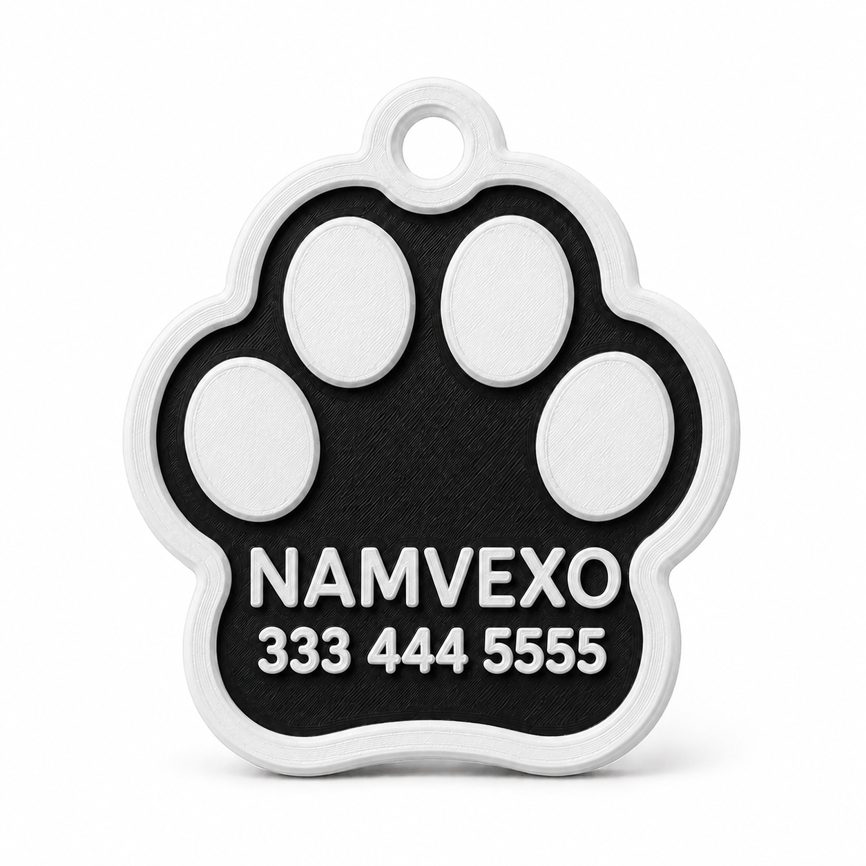 Black personalized paw-shaped pet ID tag with raised name, phone number, and collar ring
