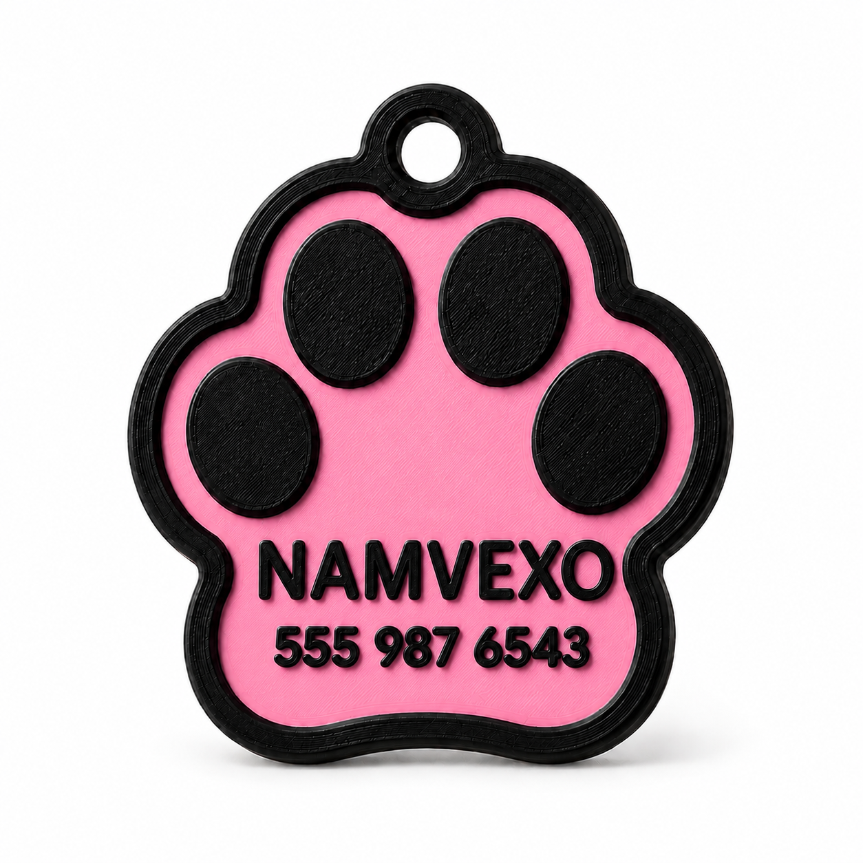 Pink personalized paw-shaped pet ID tag with raised name, phone number, and collar ring
