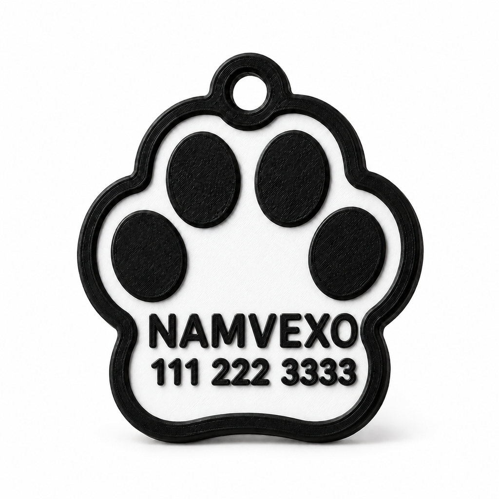 White personalized paw-shaped pet ID tag with raised name, phone number, and collar ring