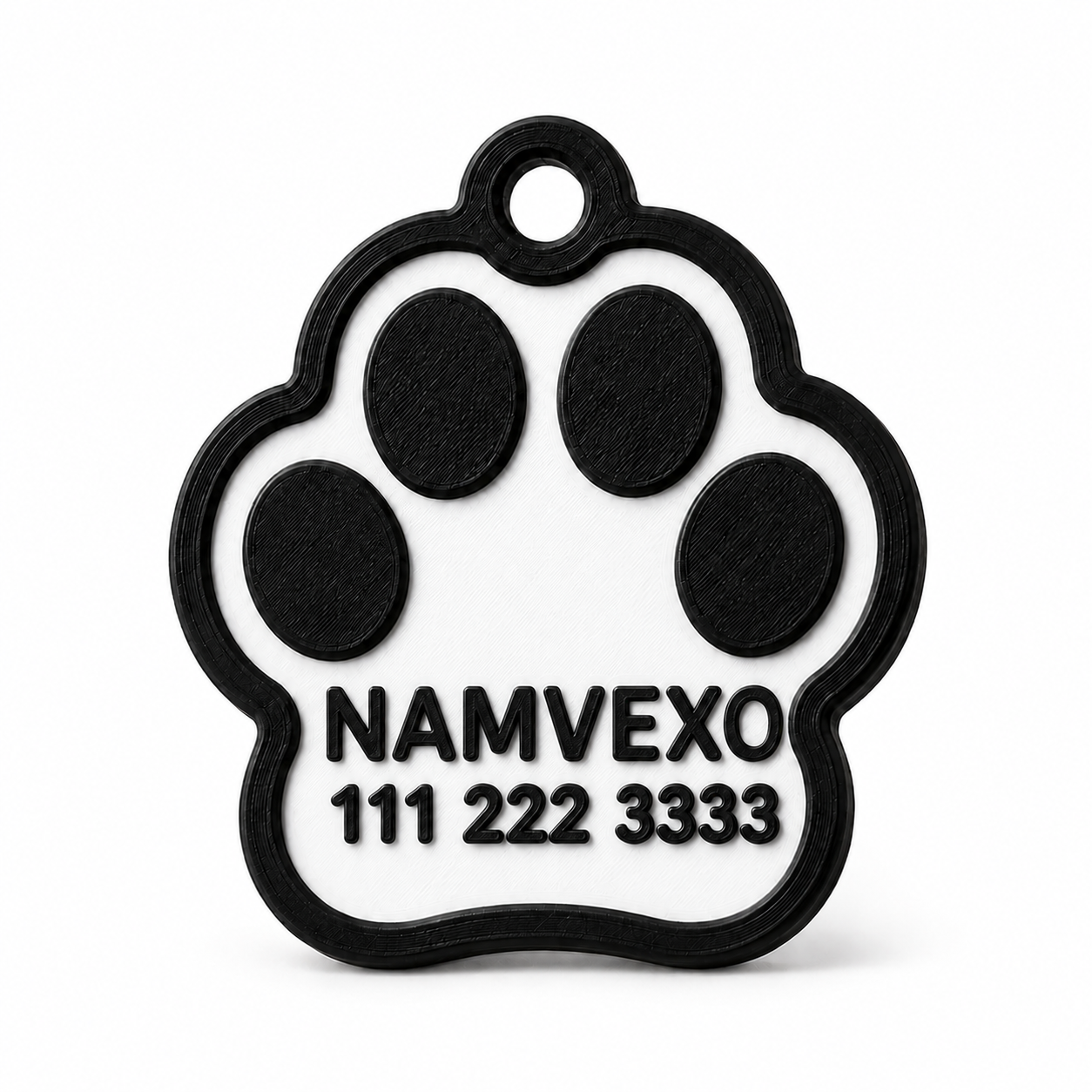 White personalized paw-shaped pet ID tag with raised name, phone number, and collar ring