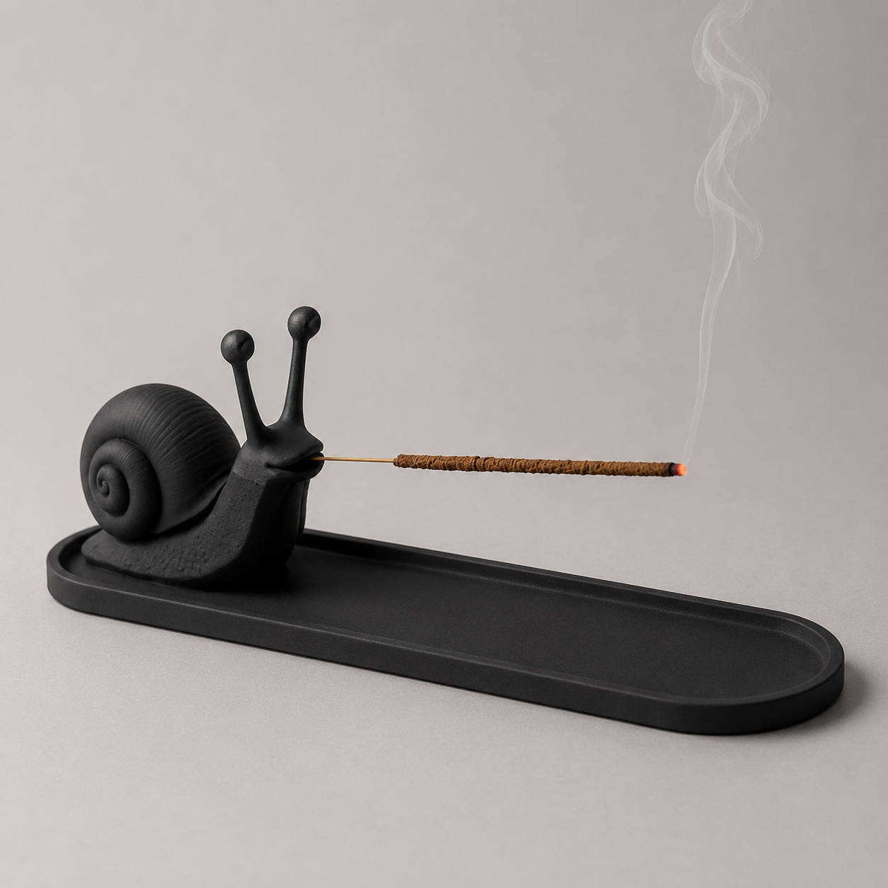 Sculptural incense stick stand with ash catching tray for contemporary interiors