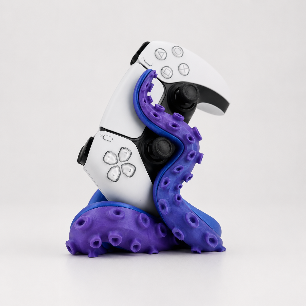 Sculptural tentacle controller stand for PlayStation 5 controller display and storage