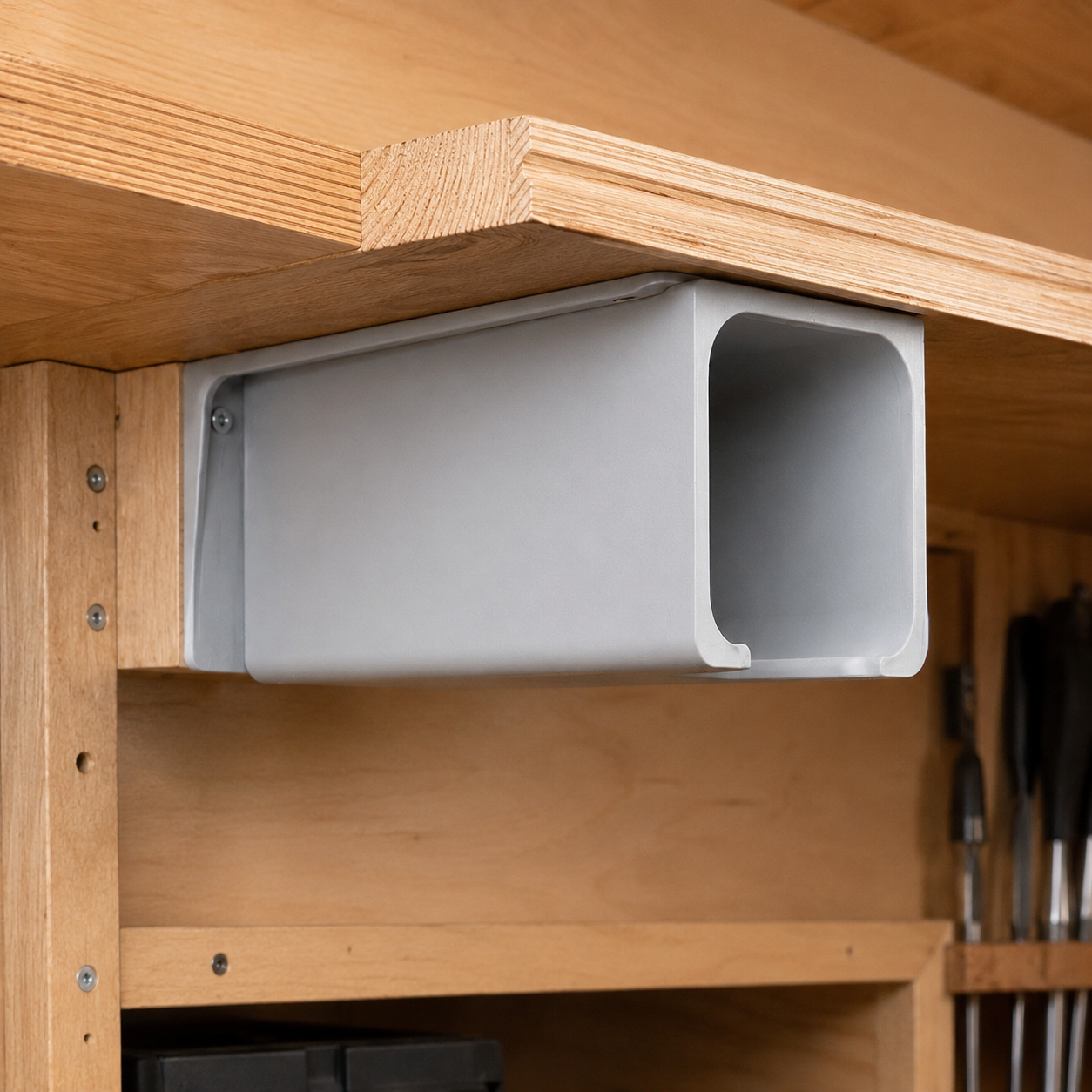 Gray hexagon drill holder designed for under-shelf installation