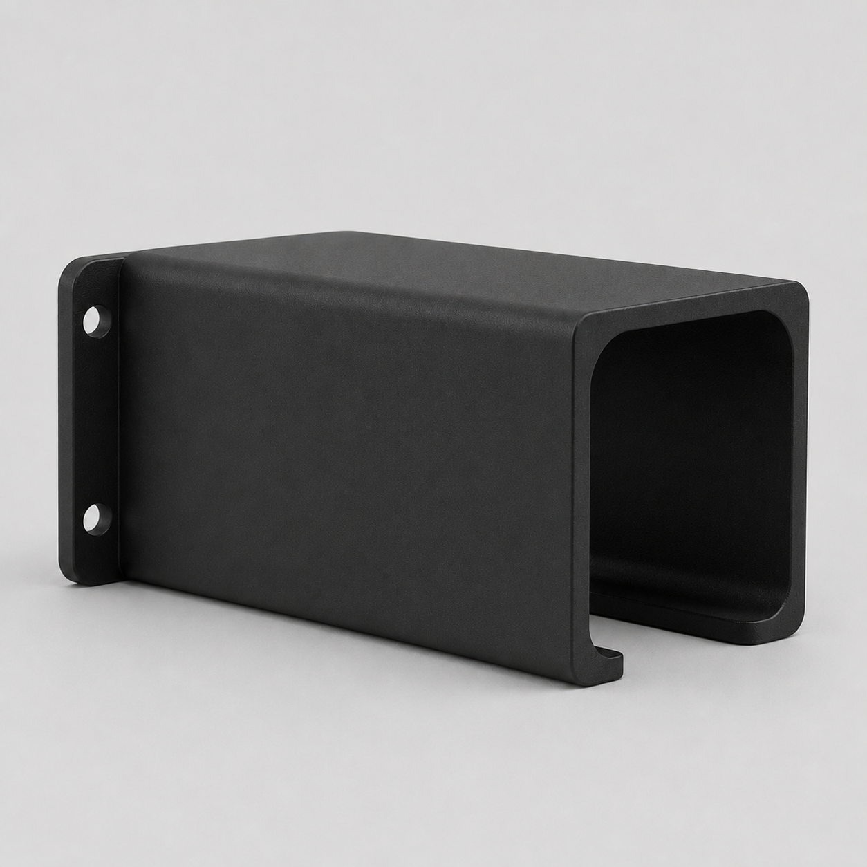Universal power tool holder showing the open front support design